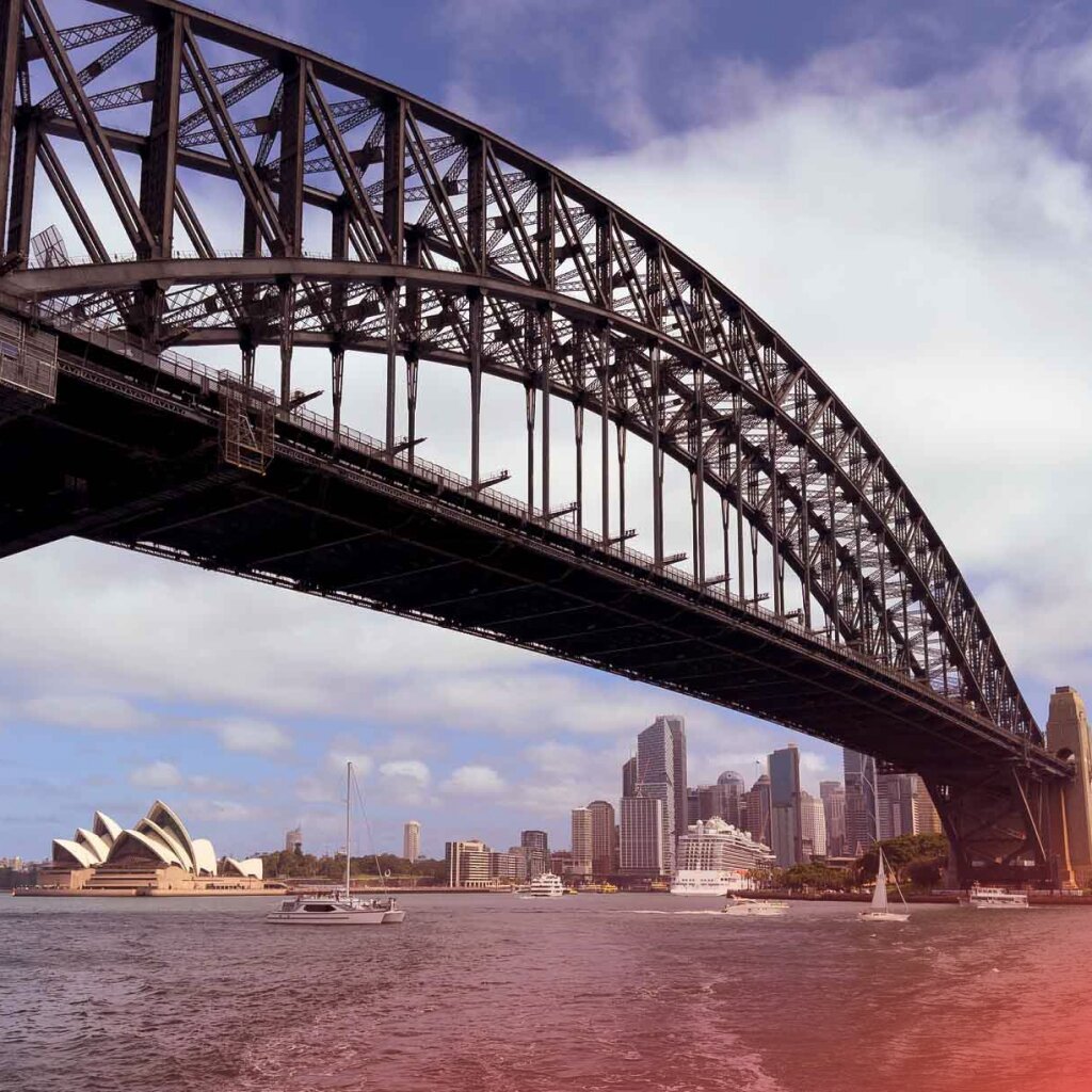 The iconic Sydney Harbour Bridge spans across the water with the Opera House and city skyline in the background, representing Octet's Australian origins.